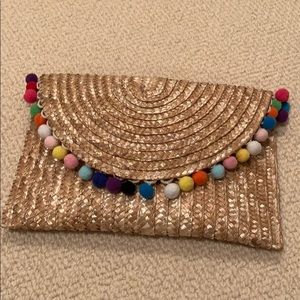 Basket weave clutch with Pom poms